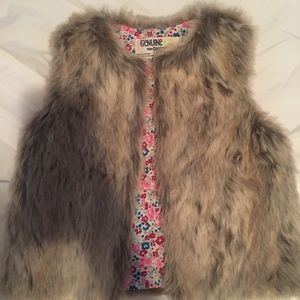 No longer fits. I absolutely love this vest!